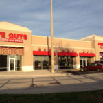 Five Guys branch with a parking lot